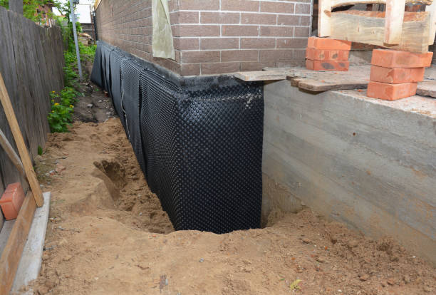 Happy homeowners after waterproofing job in Clintonville